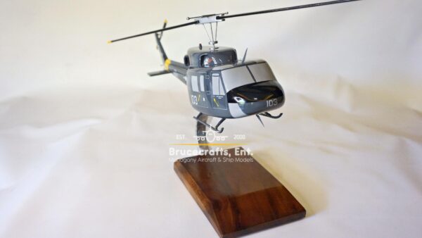 Model of UH-1N Twin Huey US NAVY 103 Aircraft with detailed craftsmanship.